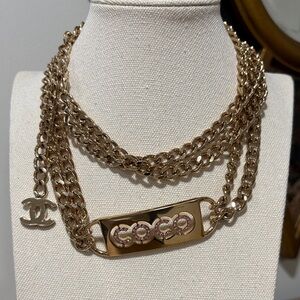 CHANEL Gold Necklace with Pink Rhinestone COCO Tag